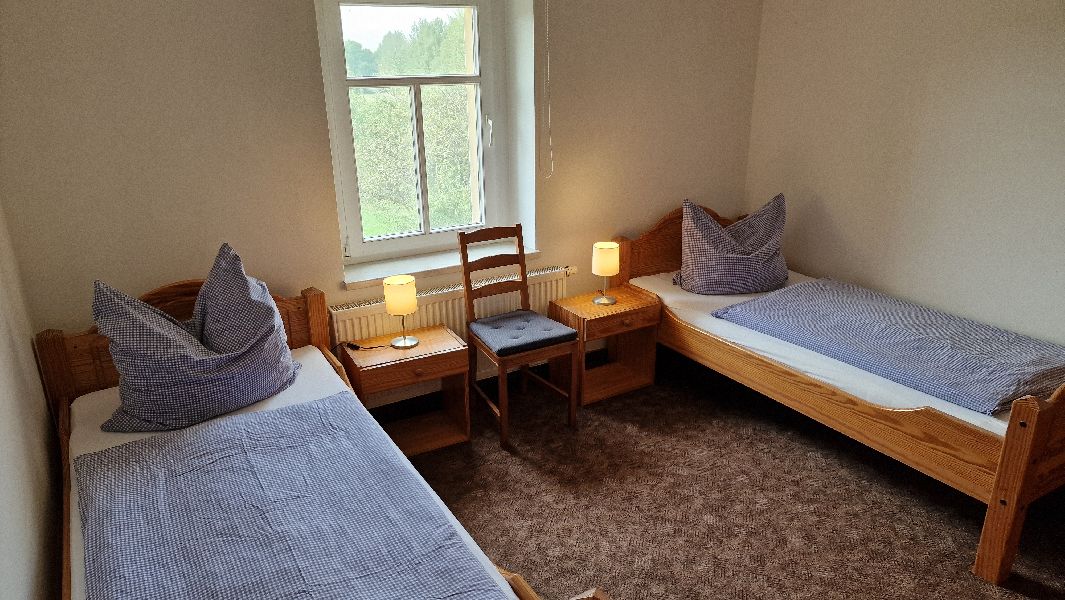 Schlafzimmer mit 2 Einzelbetten